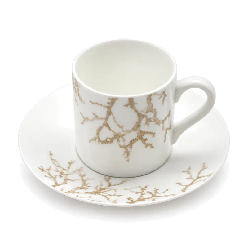 Decorated White Cup And Saucer